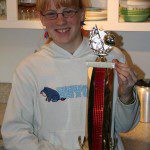 Samantha Sapp holds the 2006 Dion Parish Memorial trophy