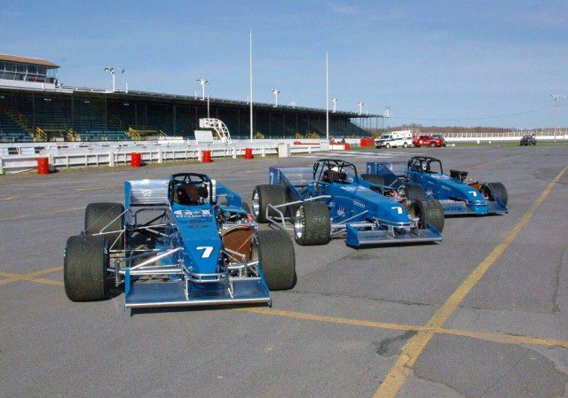 All three Nicotra Racing supermodifieds are lined up at Oswego Speedway