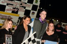 Kody Graham poses in Oswego Speedway Victory Lane after winning the supermodified feature May 20 2016