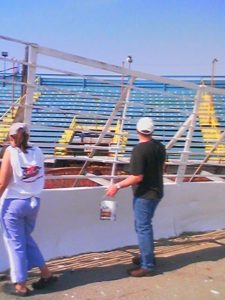 SUPRS member Danette Ray and real supermodified racer Jim Pasquin at Oswego Speedway Spruce Up Day