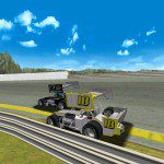 The Sandman passes Rob Warren in the grass at Sandusky Speedway
